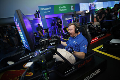 Finalist Floris Wijers of the Netherlands celebrates winning at the global final of Player 0.0 sim racing competition, hosted at the Heineken Experience on December 06, 2023 in Amsterdam